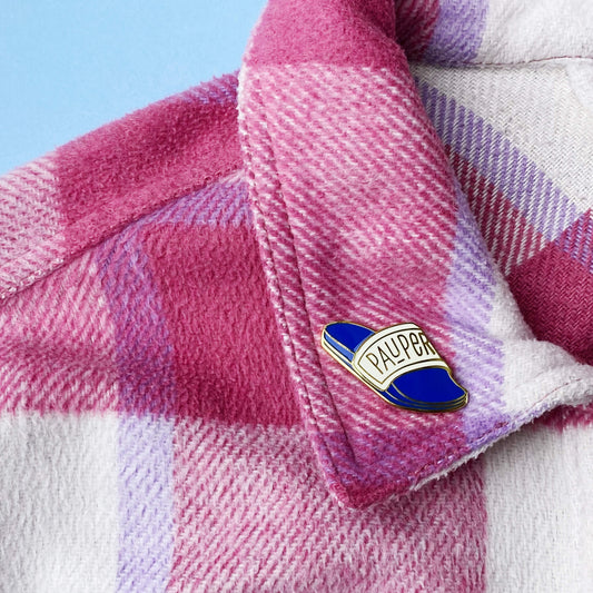 Pauper enamel pin